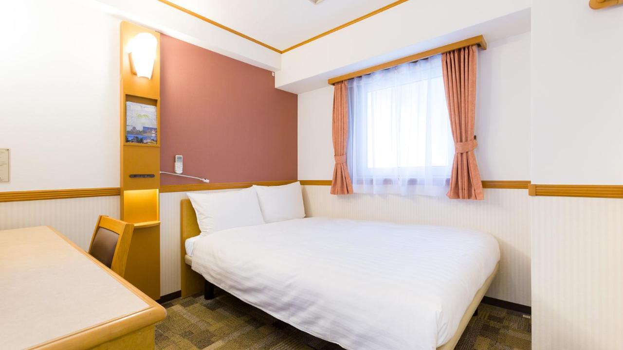Toyoko Inn Tokyo Shinagawa-Eki Takanawa-Guchi Екстер'єр фото