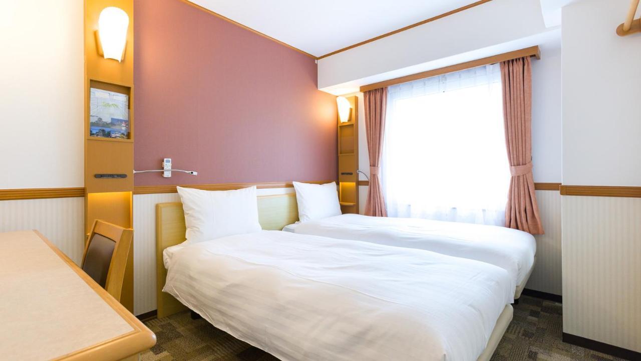 Toyoko Inn Tokyo Shinagawa-Eki Takanawa-Guchi Екстер'єр фото