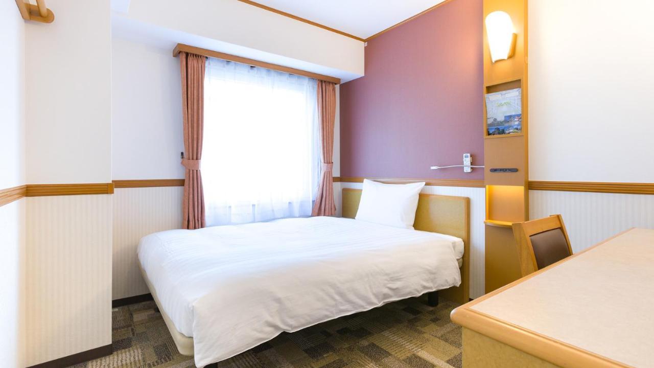 Toyoko Inn Tokyo Shinagawa-Eki Takanawa-Guchi Екстер'єр фото