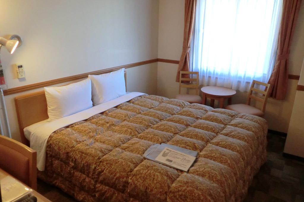 Toyoko Inn Tokyo Shinagawa-Eki Takanawa-Guchi Екстер'єр фото